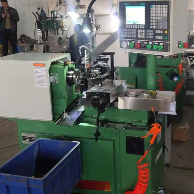 China Professional CNC Facing Chamfering Machine for Oil Seal Metal Cases Manufacturing for sale