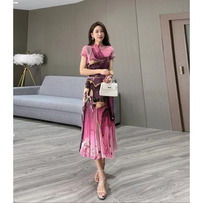 China Latest Print QUICK DRY Design Pleated T-shirt Shorts Sheaths Turtle Neck Top Loose Elastic Waist Long Skirts Women 2 Piece Sets for sale