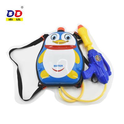 China Large capacity water gun boys and girls long shooting penguin backpack water gun garden for sale