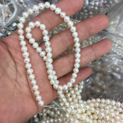 China Jewelry Making Natural Freshwater Pearl 6~7mmA Flat Round Cargo Micro-near Round DIY Handmade Beaded Jewelry Accessories Round Beads Bead Toilet for sale