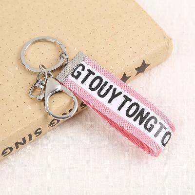 China Popular Stylish Pendant Key Chain Ring Custom Wrist Lanyard Short Backpack Key Pendant Metal Lock Lanyards with Nylon Strap for sale