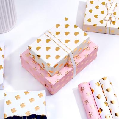 China Eco - Friendly Greaseproof Custom Design Hot Stamping Foil Gift Wrapping Paper For Christmas Wedding Birthday for sale