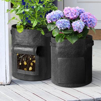 China Waterproof Round Garden Potato Planter Strawberry Felt Grow Nursery Bag for sale