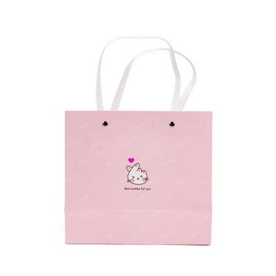 China Custom Logo Printed Paper Gift Bag Recyclable Apparel Package Paper Bag for sale