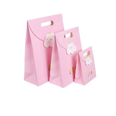 China Unique Recyclable Christmas Paper Bag With Bow Tie Ribbon for sale