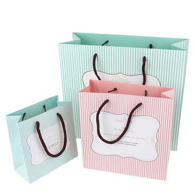 China China Recyclable High Quality Custom Printing Christmas Gift Paper Bag Retail Store Packaging Bag for sale