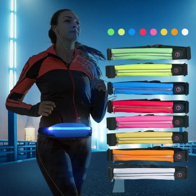 China Universal Wholesale Logo Printed Sports Running Belt LED USB Reflective Waterproof Led Elastic Waist Bag for sale