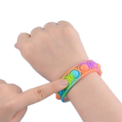 China Chridren Toys 2021 New Arrival Busy Person Snap Kids Toys Rainbow, Color Changing, Fluorescent Busty Person Wristband Push Noise For Kids Gifts for sale