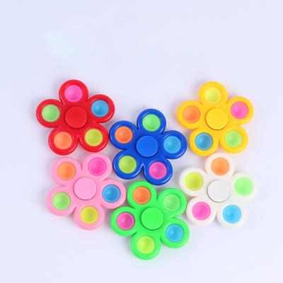 China Chridren Toys Factory Price Flower Form Popi Simple Dimple Push Popper Finger Spinner Popet Toy For Kids for sale