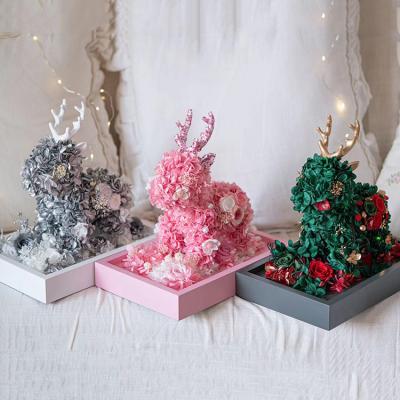 China Long Lasting Preserved In Gift 3 Stock Colors Bright Christmas Deer Shape Long Lasting Preserved Hydrangea Flowers for sale