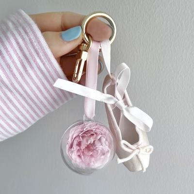 China Exquisite And Compact Key Chain Decoration Durable Preserved Rose Preserved Flower Eternal Simulation Ballet Shoe Keychain for sale