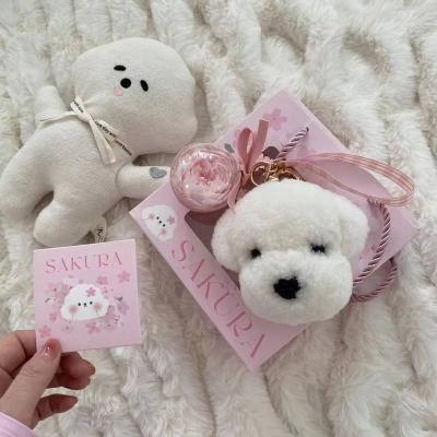 China China Wholesale Durable Cute Creative White Preserved Plush Dog Doll Accessories Other Key Chains for sale