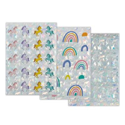 China Cute Cartoon Sticker Custom Laser Cut Vinyl Stickers Effect Rainbow Unicorn Laser Film Stickers Cartoon Sticker Sheet for sale