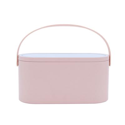 China 2021 Hot-selling Elliptical Lighted Custom Portable Handheld Makeup Mirror Box for sale