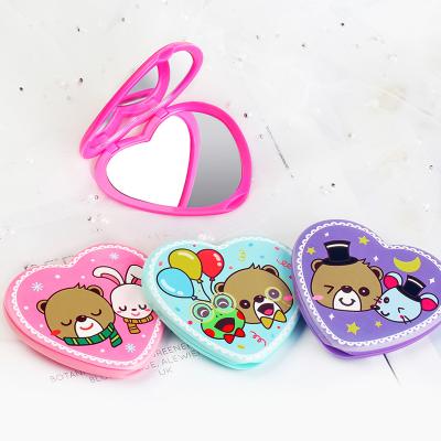 China Small Double Sided Wholesale Heart Mirror Makeup Handheld Mirror for sale