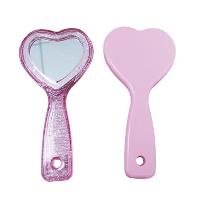 China Personalized Small Heart Hand Grip Plastic Makeup Mirror Makeup Mirror for sale