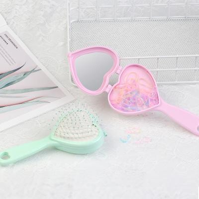 China Waterproof Plastic Conduit Collapsible Detangling Hair Brush and Mirror Set for sale