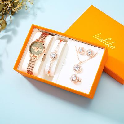 China Soft And Elastic Crystal Diamond Rose Gold Ladies Wrist Watches Luxury Soft And Elastic Bracelet Box Women Wrist Watch Clock Female Gift for sale