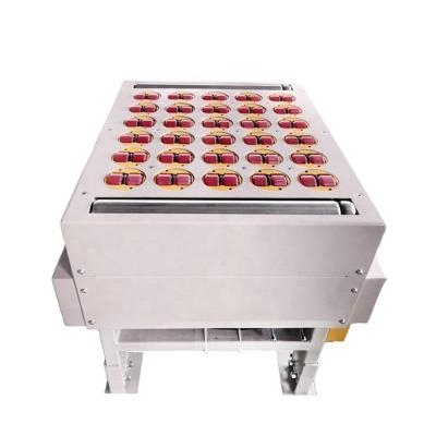 China Oil Heavy Duty Automatic Intelligent Guide Wheel Sorting Conveyor for sale