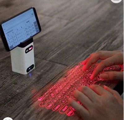 China 2021 Creative Touchpad New Arrival Projector Keyboard Gift Laser Projector Keyboard for sale