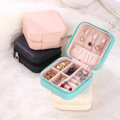 China FADELI Multifunctional Wholesale Portable Jewelry Storage Box PU Leather Small Jewelry Case Organizer Bracelet Travel Organizer With Zipper for sale