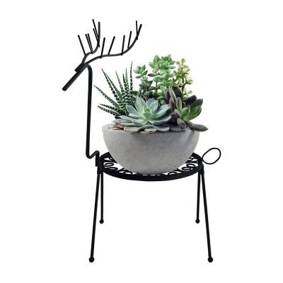 China Modern Vibrant Black Indoor or Outdoor Reindeer Floor Stand Display Decor Potted Plant Stand Iron Flower Pot or Candle Holder for sale