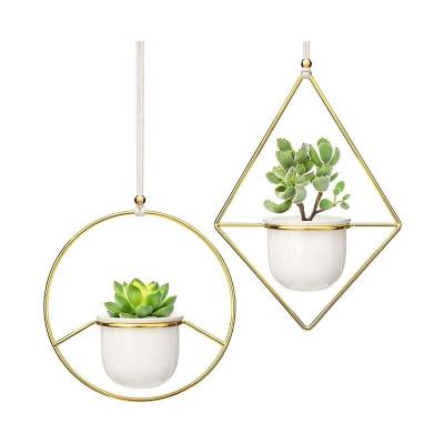 China Modern Hanging Planter Vase Set White Ceramic Plant Pot With Geometric Plant Hanger Gold Metal Flower Modern Home Decor for sale