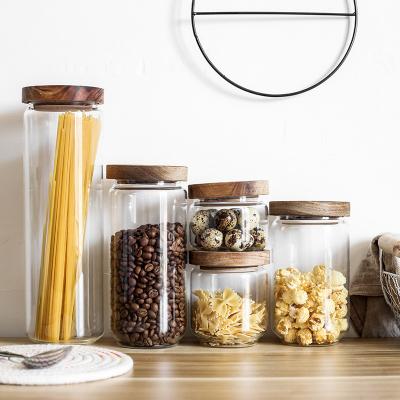 China Eco-Friendly Freshness Retention Borosilicate Cookie Candy Honey Food Glass Storage Jar With Airtight Lid Bamboo Storage Jar for sale