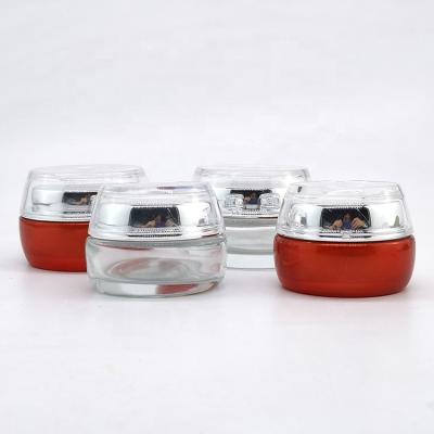 China Personal Care Beauty Wholesale Containers Glass Cosmetic Cream Jar With Gold Cap for sale