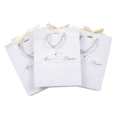 China Kraft Paper Packaging Paper Bags With Logo Handles Customized Paper Bag With Printed for sale