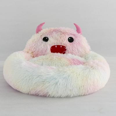 China Breathable Pet Supplies Plush Little Monster Pet Bed Mattress Dog Bed Autumn And Winter Creative Warm Cat Bed for sale