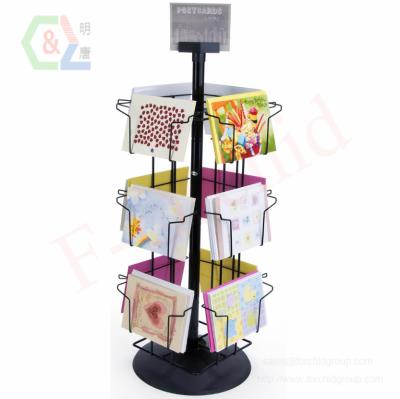 China Single Rotating Greeting Card Counter Display With Sign Clip , 12 Horizontal Pockets for sale