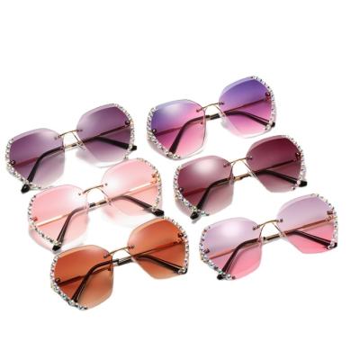 China New Trendy Rimless Rimless Diamond Polygonal Sunglasses Female Over The River Filed Sun Glass For Ladies for sale