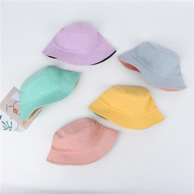 China Custom Picture Cotton Kids Double Sided Hats Reversible Bucket Hat For Kids for sale