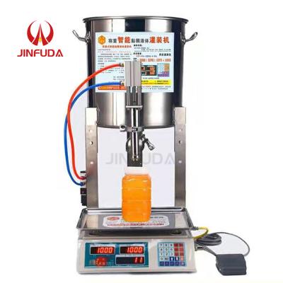 China 201 Stainless Steel Food Filling Machine Weighing Liquid Filling Machine Small Quantitative Sanitary Filling Machine for sale