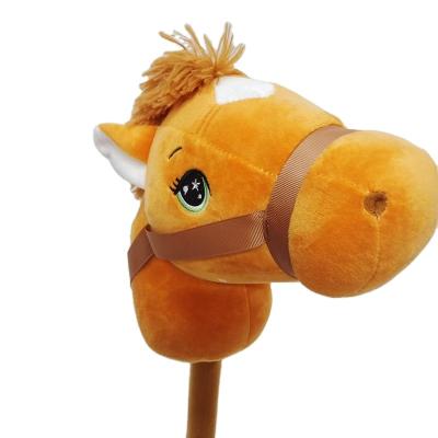 China Ride on Toy Brown and Pink Stick Plush Unicorn with realistic pop and galloping sound for sale