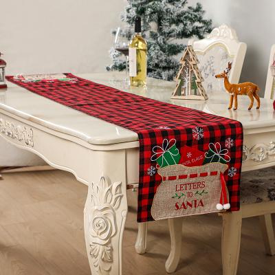 China Simple Christmas Embroidered Santa Sacks Pattern Red Plaid Table Runner for Christmas Table Decoration for sale