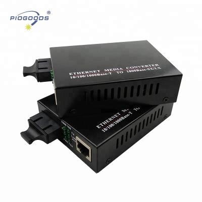 China FTTX 10/100/1000M Mode Duplex Fiber 20km Media 1310nm Media Converter SC 5VDC Single Fiber Optic Power Supply for sale