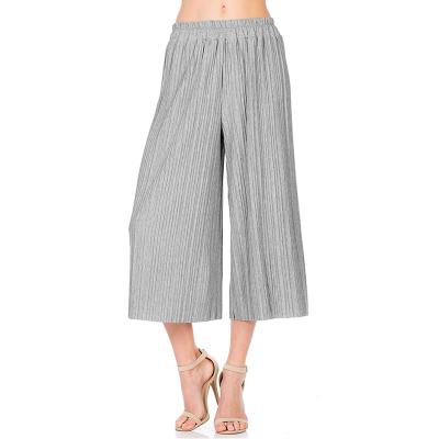 China Anti-Wrinkle Solid Color Pleated Casual Wide Leg Pants New Summer Large Size Women's Fashion Loose Waist Women's Elastic Pants for sale