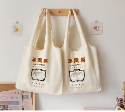 China 100% Eco-friendly Reusable Cotton Canvas Shopping Bag Wholesale Printing Black Tote Bags for sale