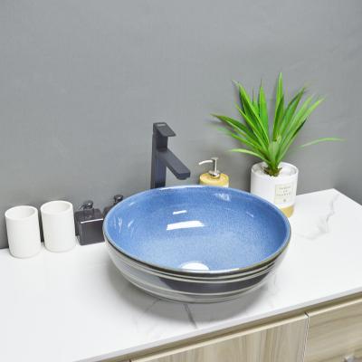 China Easy Clean Luxury Acceptable Round Shape Blue Porcelain Wash Basin Bathroom Countertop Customized Ceramic Basins for sale