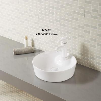 China Modern Bathroom Sink Glazed Ceramic Large Round Countertop Cabinet Porcelain Basin for sale