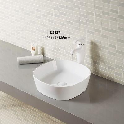 China Clean Modern Rectangular Modern Vanity Sink Countertops Ceramic Basin In Bathroom for sale