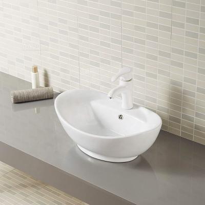 China EUROPEAN Oval Shape Countertop Art Basin White Ceramic Bathroom Vessel Sink for sale