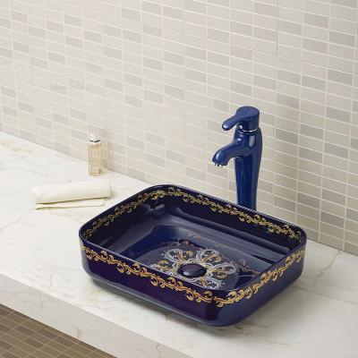 China Easy Clean Countertop Basin With Golden Ceramic Decal Rectangular Wash Basin for sale