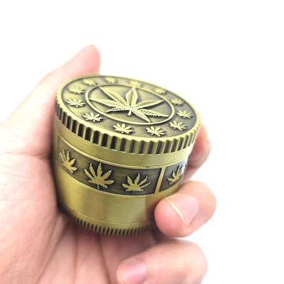 China Classic Sheet Etched Zinc Alloy Bronze Silver 50mm 4 Pieces Weed Herb Grinder Tobacco Spice Mill Machine for sale