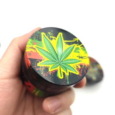 China Stylish Cover Herb Grinder Smoking Accessories China Factory New Arrival Weed Grinder Tinplate Plastic Cover for sale