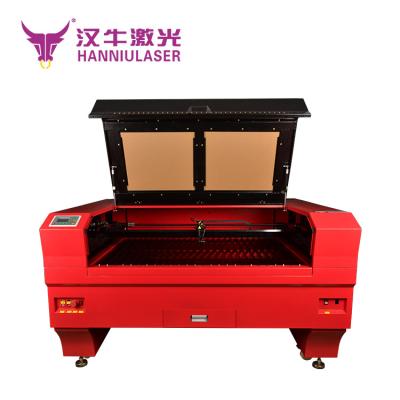 China Laser Engraving Hanniu 100w CO2 Laser Engraving Machine Cutting Machines Cutton Fabric Engraver for sale