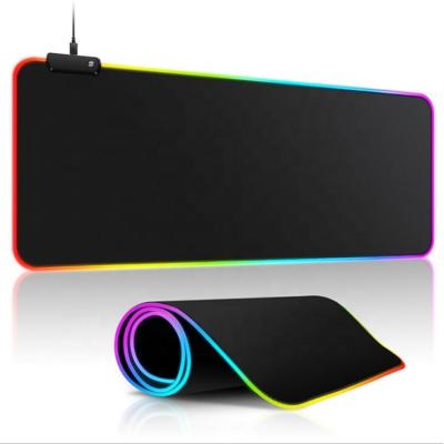 China Eco-friendly Gaming Mouse Pad Large Gamer Natural Rubber LED Mouse Mat with Backlit RGB Computer Mousepad for sale