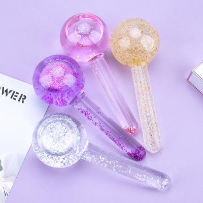 China Custom Rose Gold Roller Ice Globes Cooling Facial Face Lift Glitter Beauty Tool Rose Color Massage for sale